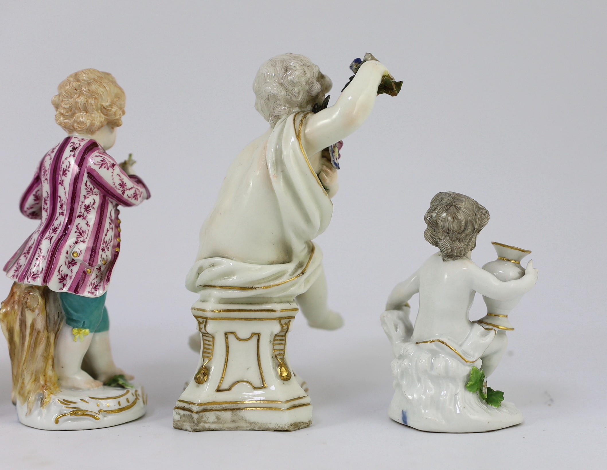 Six Meissen porcelain figures of putti and a boy, second half 18th century, 8.5cm - 14.5cm high, restorations